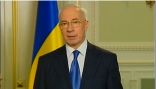 أوكروانيا توافق على إلغاء تقييد التظاهر واستقالة رئيس الوزراء من أجل الوحدة