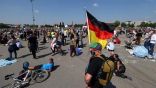 ألمانيا: تظاهرات غاضبة ضد الحظر.. وسفير أمريكا يستقيل